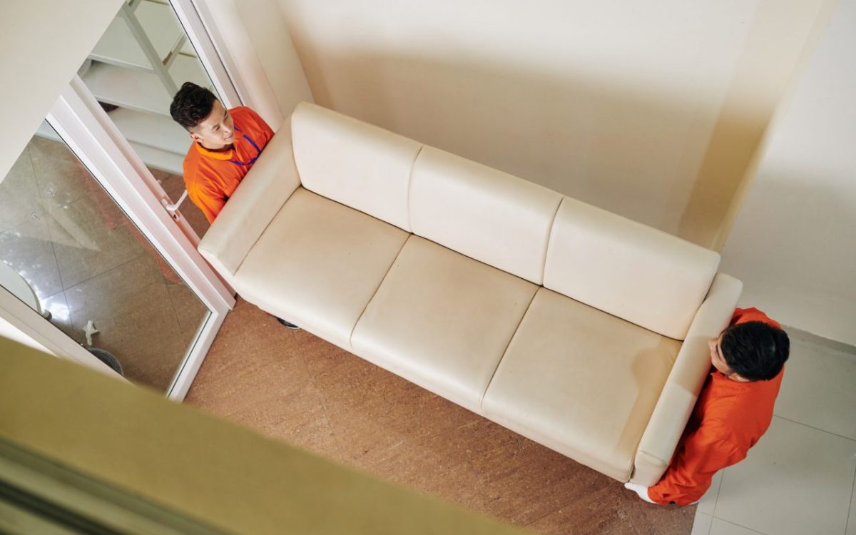 movers-carrying-leather-sofa.jpg